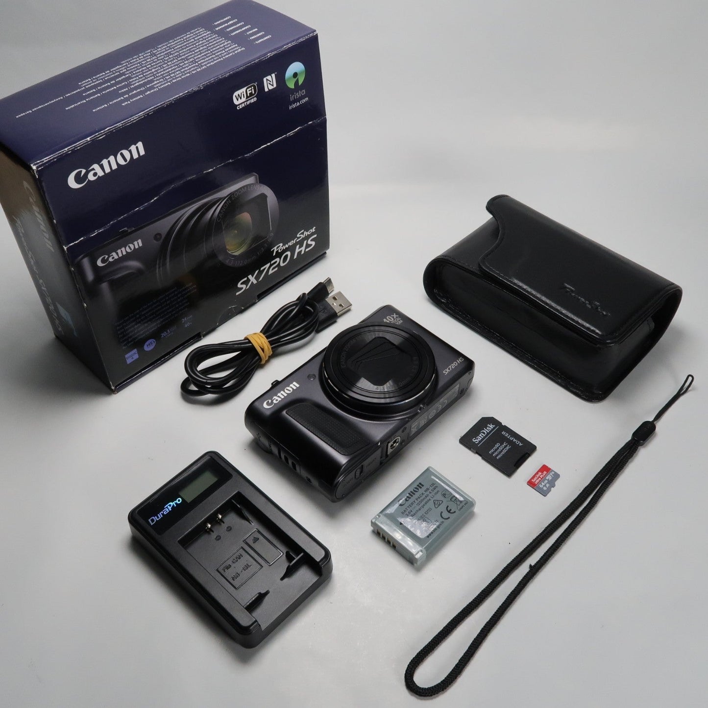 Pre-owned Canon PowerShot SX720 HS 20.3MP 40x Digital Camera Black + Case + 64GB SD Card