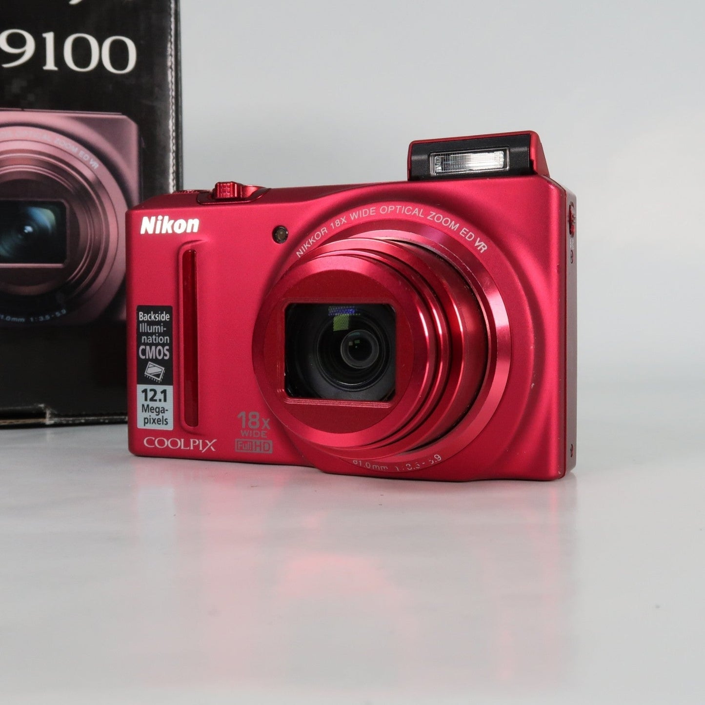 Pre-owned Nikon Coolpix S9100 12.1MP 18x Digital Camera Red, Case, SD Card – Very Good