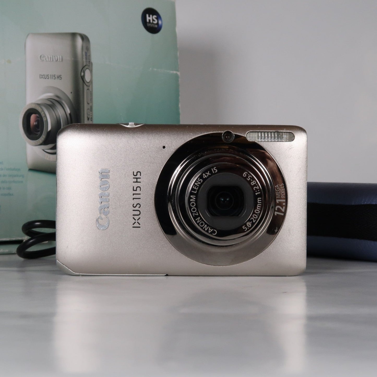 Pre-owned Canon IXUS 115 HS PowerShot ELPH 100 HS 12.1 MP 4x Digital Camera Silver