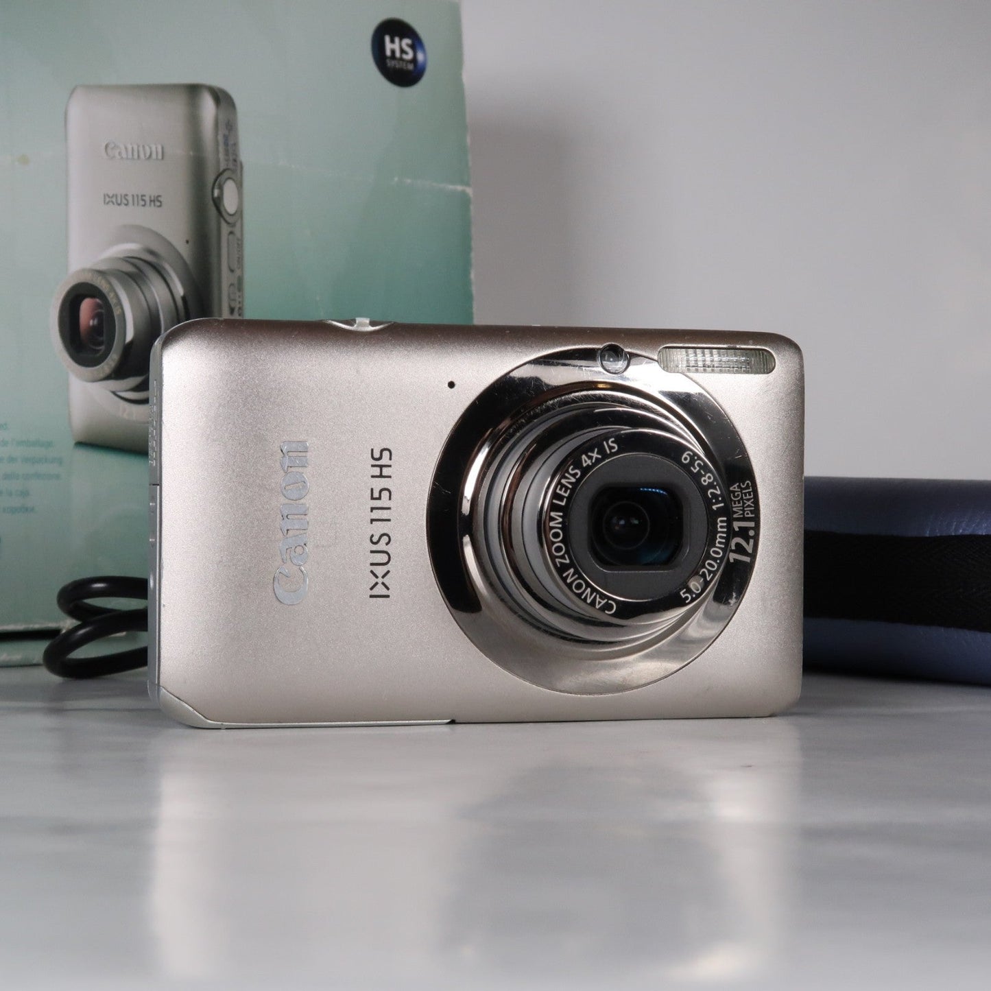 Pre-owned Canon IXUS 115 HS PowerShot ELPH 100 HS 12.1 MP 4x Digital Camera Silver