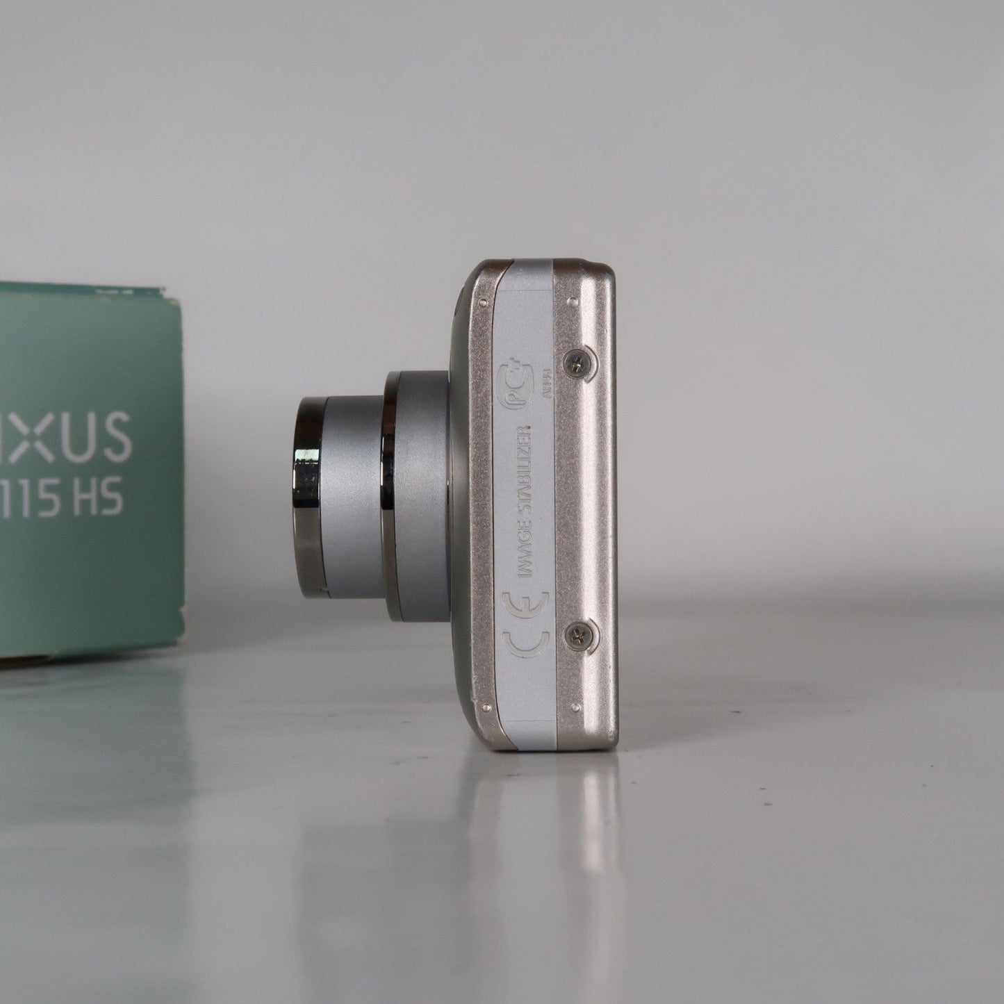 Pre-owned Canon IXUS 115 HS PowerShot ELPH 100 HS 12.1MP 4x Digital Camera Silver – Very Good Condition