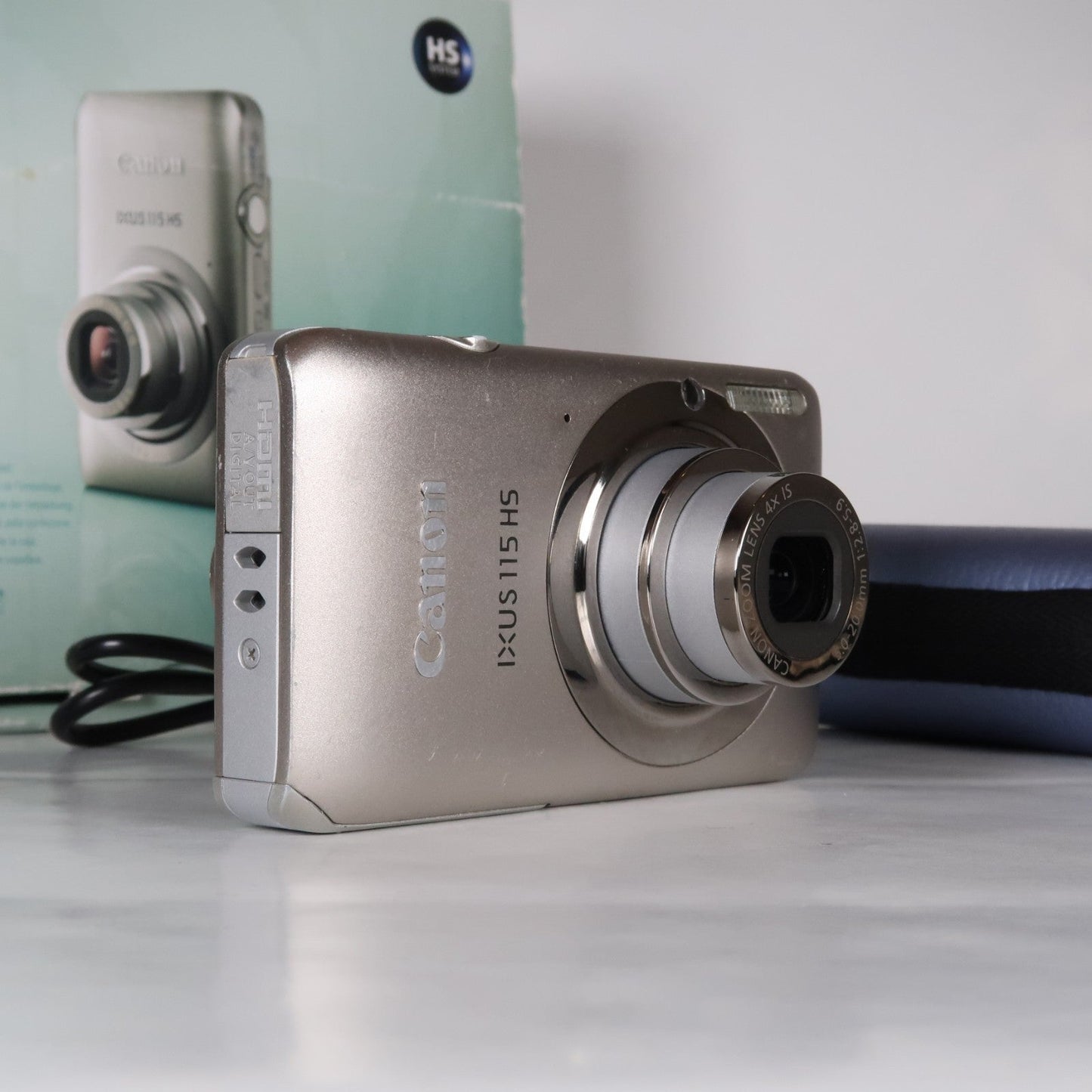 Pre-owned Canon IXUS 115 HS PowerShot ELPH 100 HS 12.1 MP 4x Digital Camera Silver
