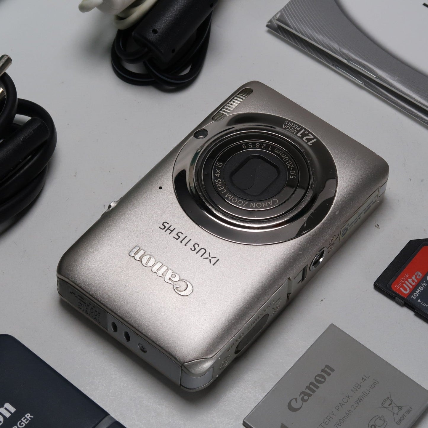 Pre-owned Canon IXUS 115 HS PowerShot ELPH 100 HS 12.1MP 4x Digital Camera Silver – Very Good Condition