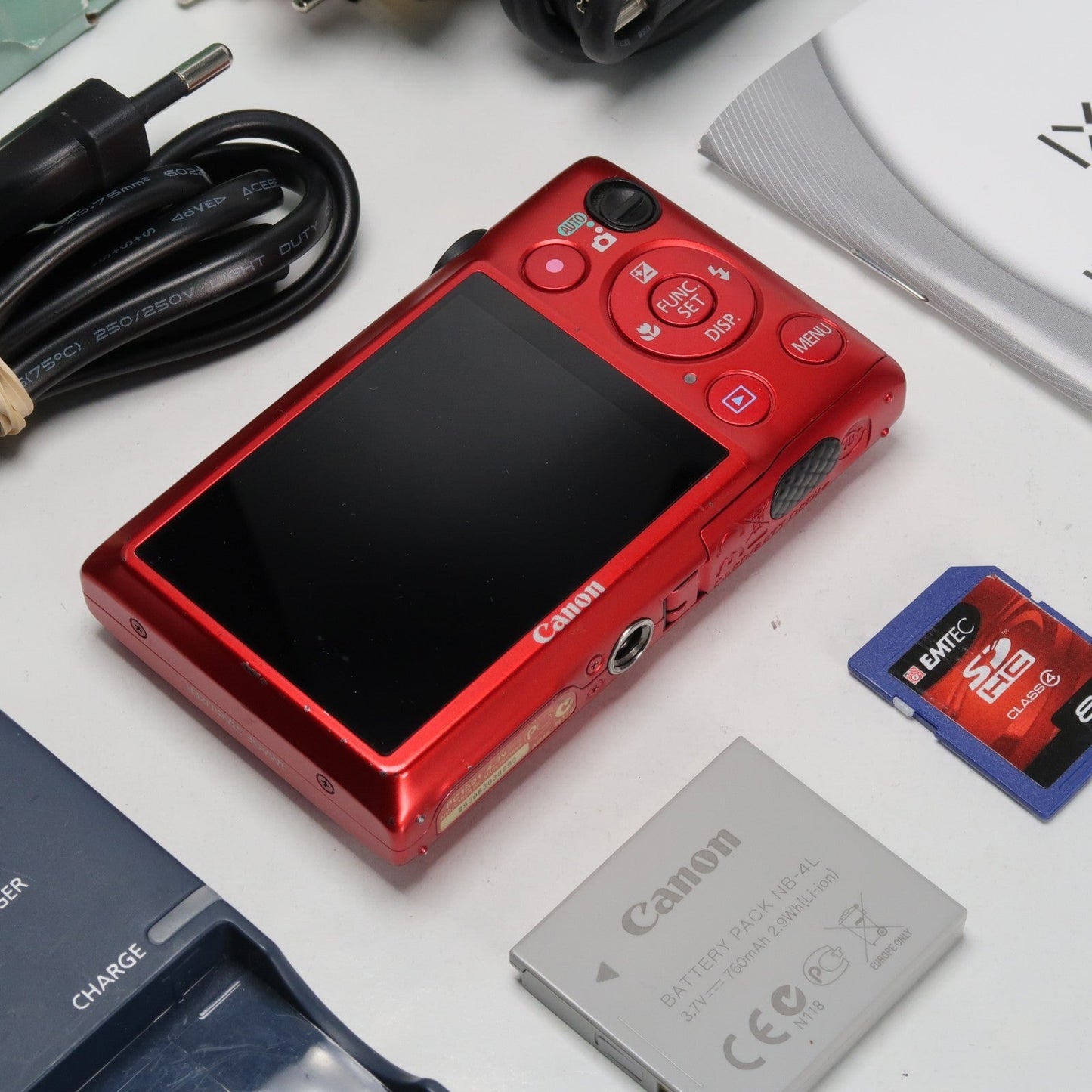 Pre-owned Canon IXUS 220 HS 12.1MP Digital Camera Red – Boxed Set