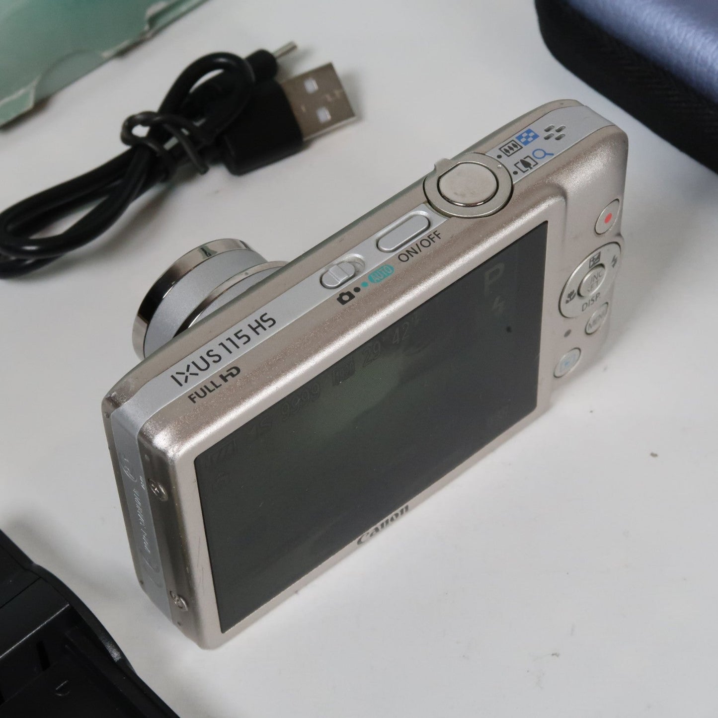 Pre-owned Canon IXUS 115 HS PowerShot ELPH 100 HS 12.1 MP 4x Digital Camera Silver