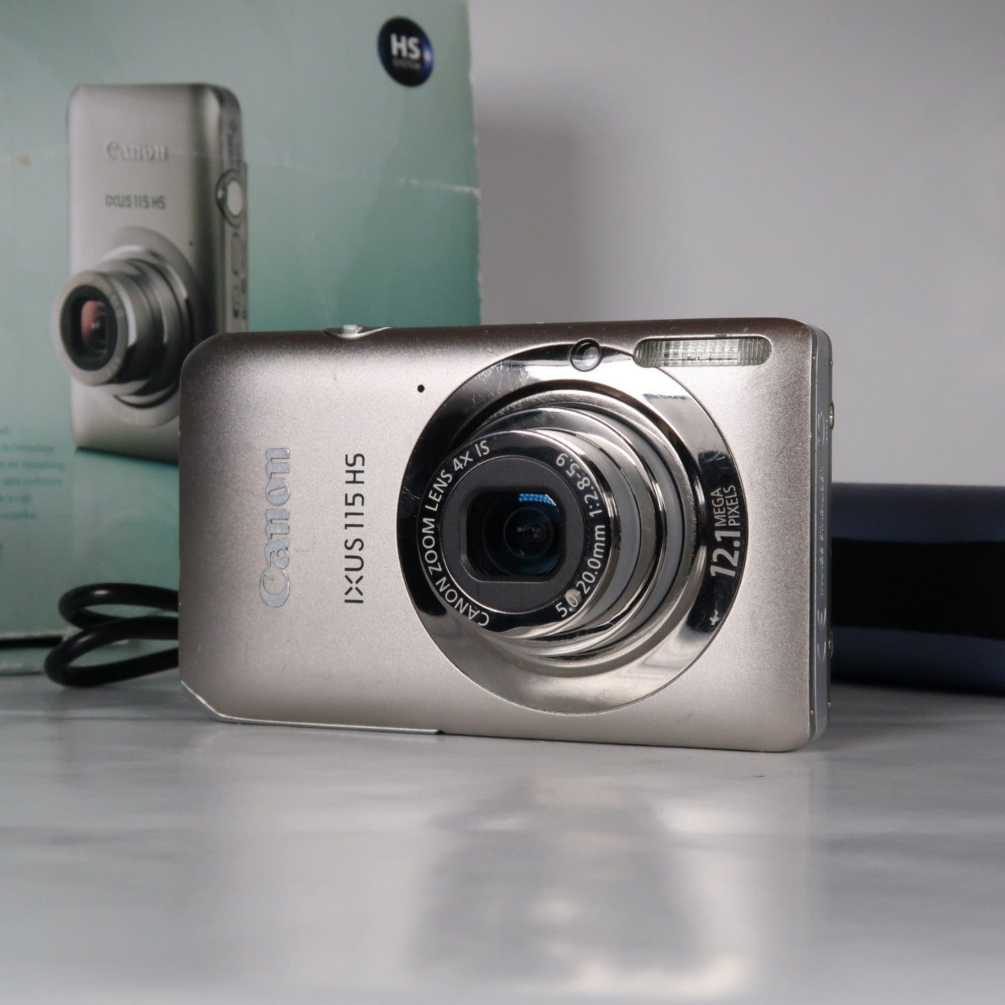 Pre-owned Canon IXUS 115 HS PowerShot ELPH 100 HS 12.1 MP 4x Digital Camera Silver