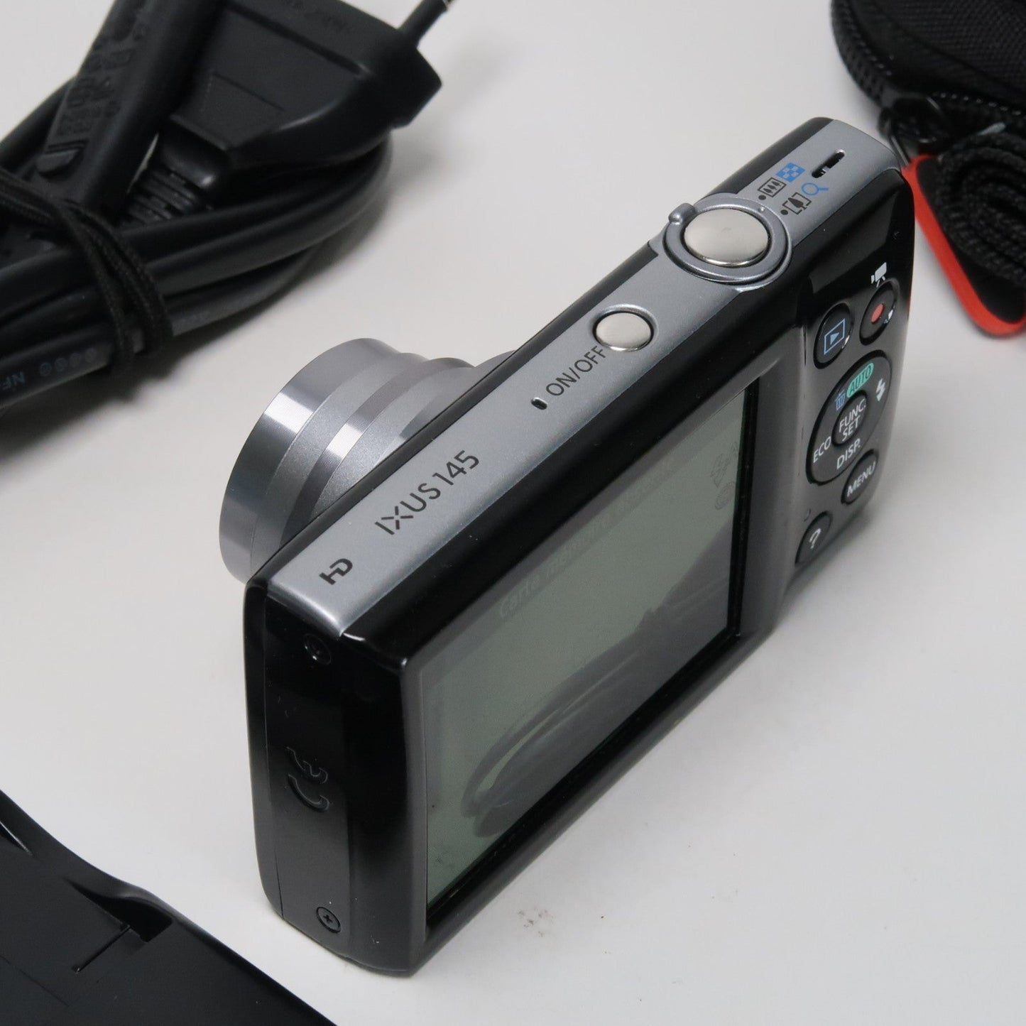 Pre-owned Canon IXUS 145 / ELPH 135 16.0MP Digital Camera Black – With SD Card 4GB & Case