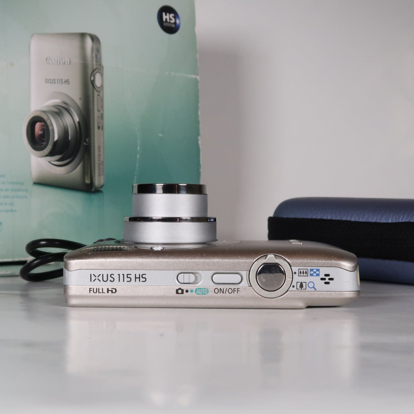 Pre-owned Canon IXUS 115 HS PowerShot ELPH 100 HS 12.1 MP 4x Digital Camera Silver