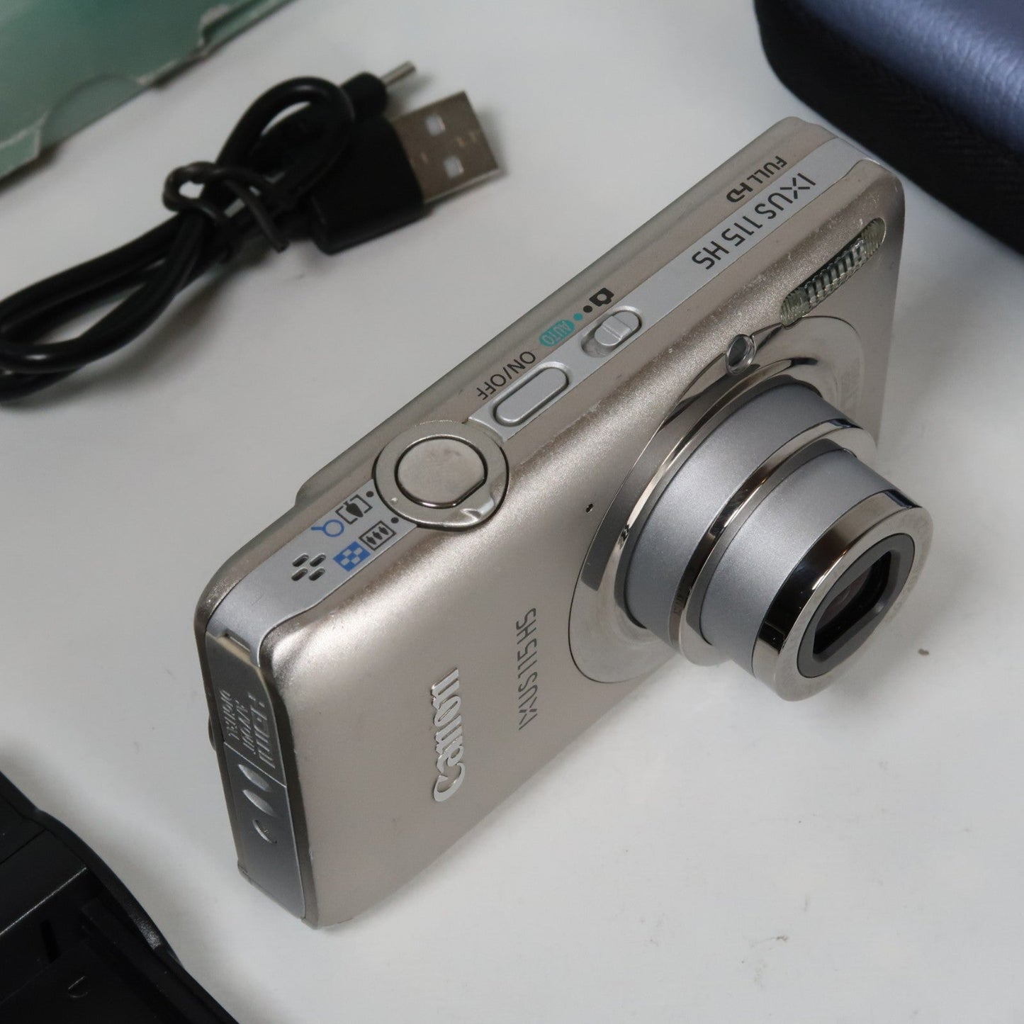 Pre-owned Canon IXUS 115 HS PowerShot ELPH 100 HS 12.1 MP 4x Digital Camera Silver