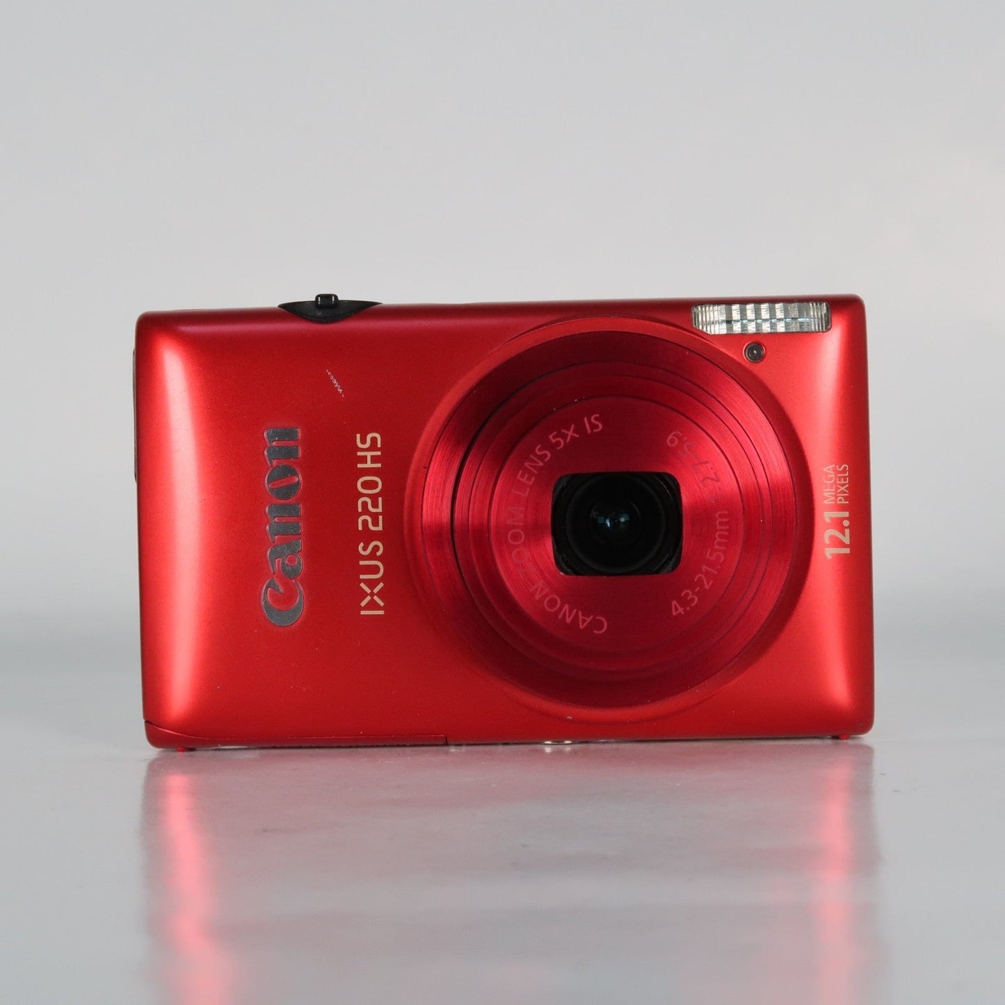 Pre-owned Canon IXUS 220 HS 12.1MP Digital Camera Red – Boxed Set