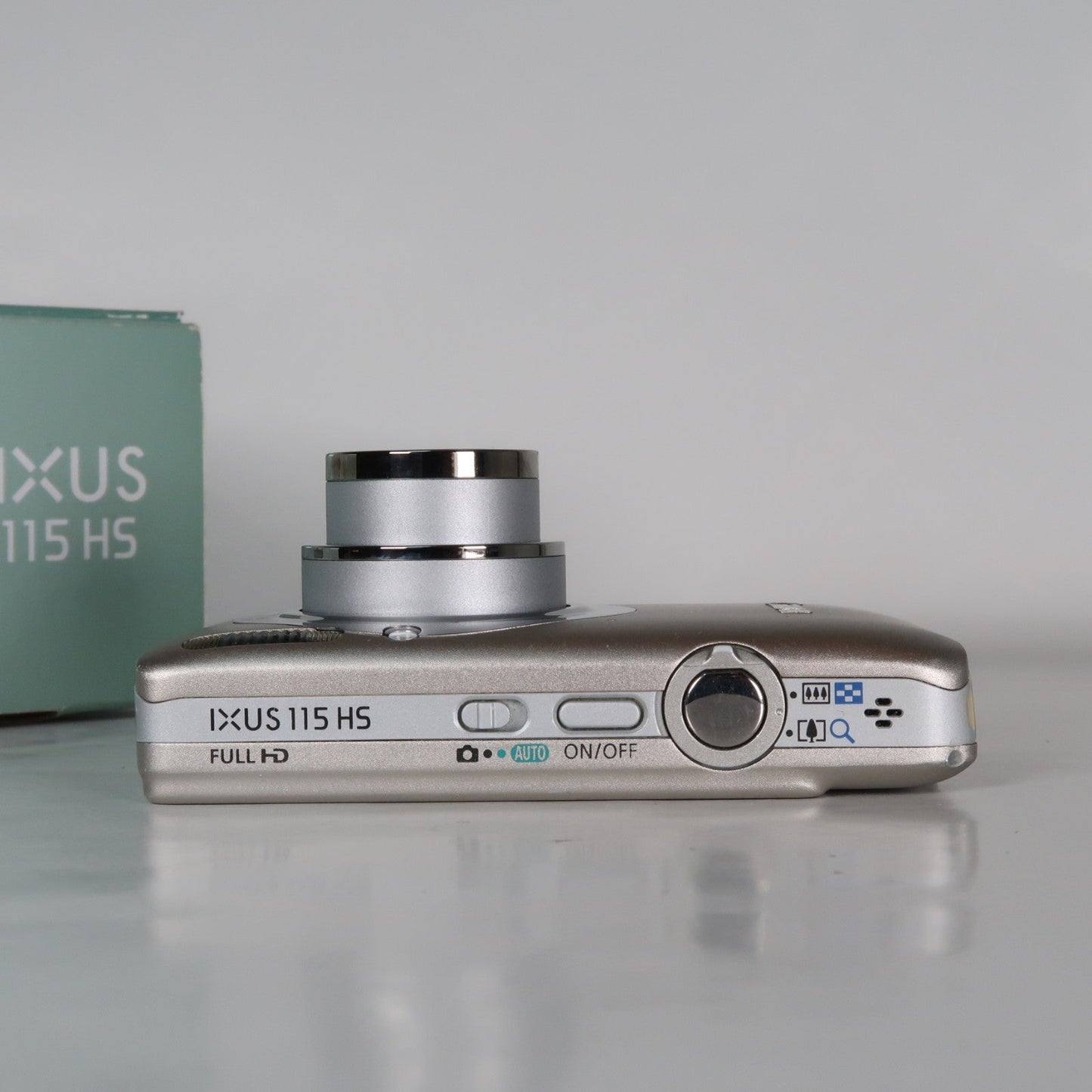 Pre-owned Canon IXUS 115 HS PowerShot ELPH 100 HS 12.1MP 4x Digital Camera Silver – Very Good Condition