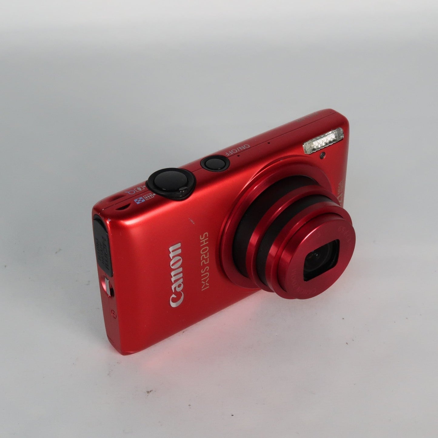 Pre-owned Canon IXUS 220 HS 12.1MP Digital Camera Red – Boxed Set
