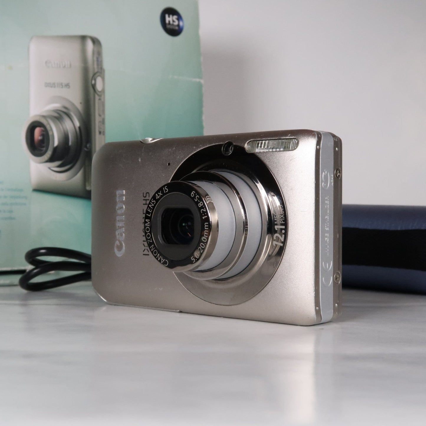Pre-owned Canon IXUS 115 HS PowerShot ELPH 100 HS 12.1 MP 4x Digital Camera Silver