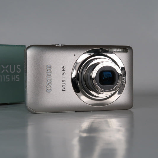 Pre-owned Canon IXUS 115 HS PowerShot ELPH 100 HS 12.1MP 4x Digital Camera Silver – Very Good Condition