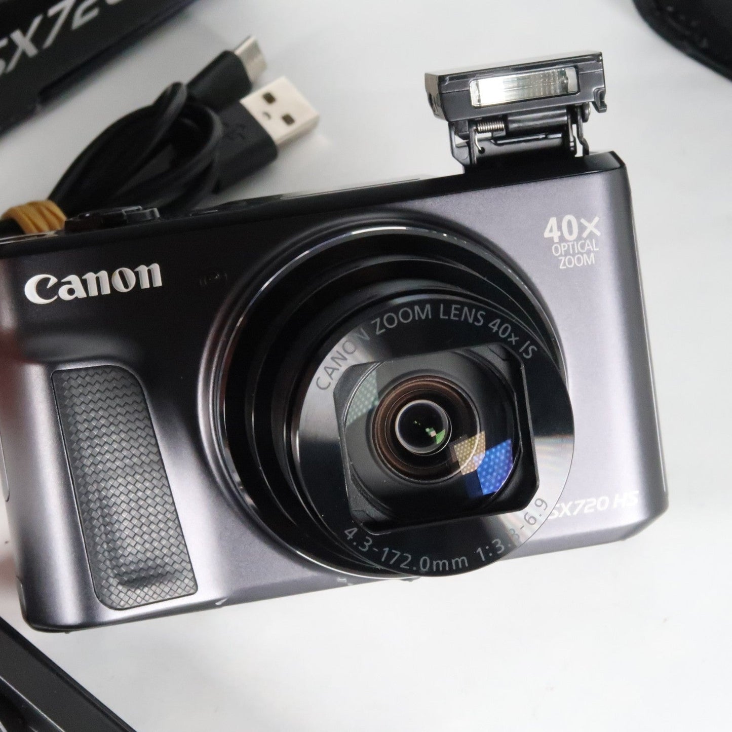 Pre-owned Canon PowerShot SX720 HS 20.3MP 40x Digital Camera Black + Case + 64GB SD Card