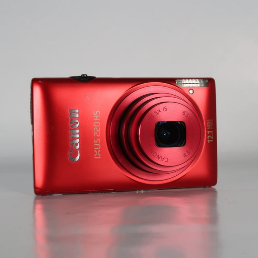 Pre-owned Canon IXUS 220 HS 12.1MP Digital Camera Red – Boxed Set