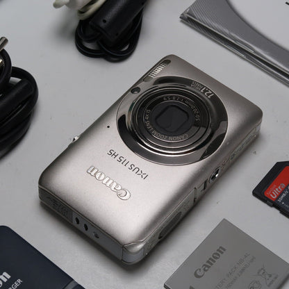 Pre-owned Canon IXUS 115 HS PowerShot ELPH 100 HS 12.1MP 4x Digital Camera Silver – Very Good Condition