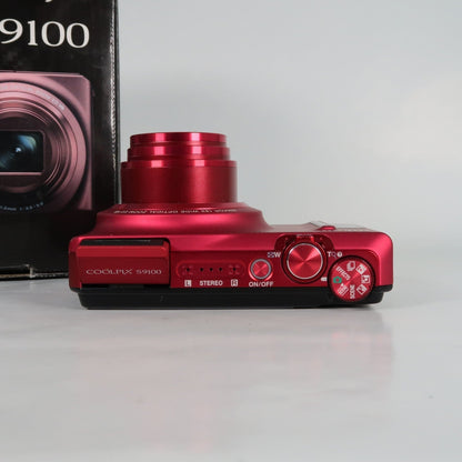 Pre-owned Nikon Coolpix S9100 12.1MP 18x Digital Camera Red, Case, SD Card – Very Good