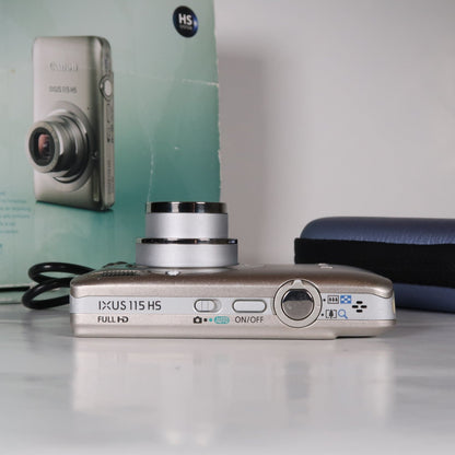 Pre-owned Canon IXUS 115 HS PowerShot ELPH 100 HS 12.1 MP 4x Digital Camera Silver