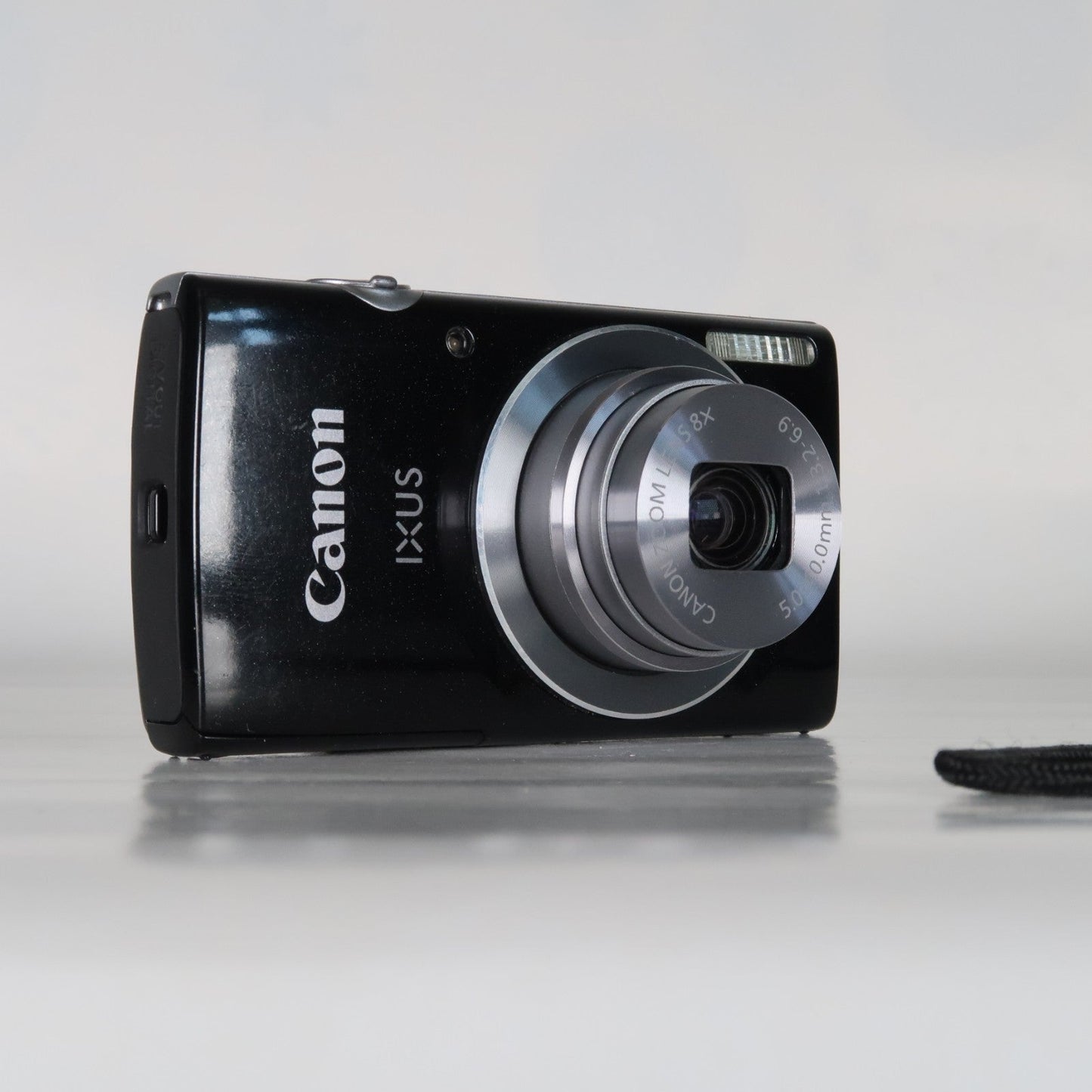 Pre-owned Canon IXUS 145 / ELPH 135 16.0MP Digital Camera Black – With SD Card 4GB &amp; Case