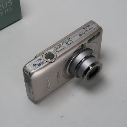 Pre-owned Canon IXUS 115 HS PowerShot ELPH 100 HS 12.1MP 4x Digital Camera Silver – Very Good Condition