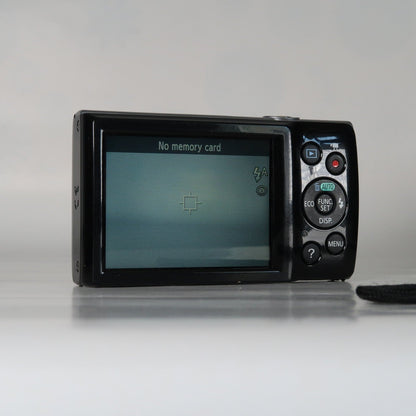Pre-owned Canon IXUS 145 / ELPH 135 16.0MP Digital Camera Black – With SD Card 4GB &amp; Case