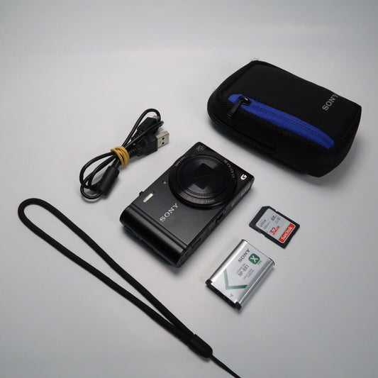 Pre-ownedSony Cyber-Shot Digital Cameras DSC-WX300 18.2MP  Black with Case and 32GB SD Card